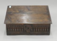 An 18th century and later oak bible box with sloping top. 60.5 cm wide.