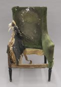A Regency period upholstered easy chair with mahogany show wood. 69 cm wide.