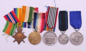 A collection of military medals, including a 1914-15 Star awarded to 8301 Pte F Brockett R.