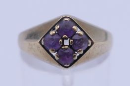An 8 ct gold amethyst ring. Ring size N/O. 2.4 grammes total weight.