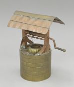 A scratch built brass wishing well. 23 cm high.