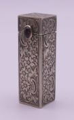 An 800 silver lipstick case with concealed mirror. 6 cm high.