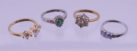 Four 14 K gold rings. 11.9 grammes total weight. Ring sizes 3 x M 1 X P.