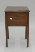 An early 20th century oak sewing box. 32 cm wide and 51 cm high.
