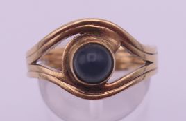 A 9 ct gold moonstone ring. Ring size R/S. 3.9 grammes total weight.