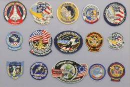 A collection of Nasa Mission Badges, framed and glazed. 54.5 x 72 cm overall.