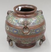 A late 19th/early 20th century Japanese bronze and enamel jardiniere. 23.5 cm high.