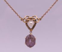 An Art Nouveau 9 ct gold amethyst and cultured pearl pendant necklace. Pendant 2.