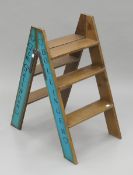 A set of 'Champagne' ladders. 87 cm high.