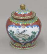 A cloisonne lidded jar. 13 cm high.