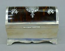 A silver and tortoiseshell trinket box. 9 cm wide. 143.2 grammes total weight.