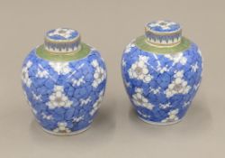 A pair of Japanese porcelain ginger jars. 12.5 cm high.