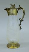 A Victorian silver plate-mounted etched glass claret jug. 29 cm high.