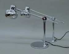 A pair of chrome anglepoise lamps. Each 43 cm long.