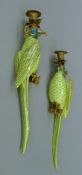 A pair of gilt metal-mounted porcelain parrot-form wall sconces. Each 47.5 cm high.