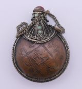 A 19th century Tibetan snuff bottle and stopper. 6.5 cm high.