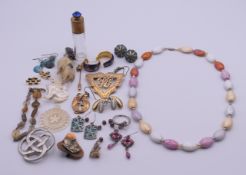 A quantity of various jewellery to include earrings, a St Justin pewter Celtic knot brooch,
