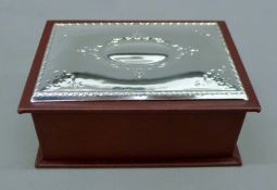 A silver topped jewellery box. 16.5 cm wide.