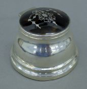 A silver and tortoiseshell inkwell. 5.5 cm high.