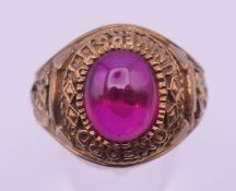 A 9 ct gold Oxford University graduation ring. Ring size Z+. 11.4 grammes total weight.