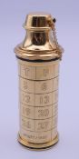 A Must de Cartier refillable 10 ml spray perfume bottle with functional calendar. 10 cm high.