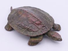 A Japanese bronze model of a tortoise. 7.5 cm long.