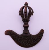 A Tibetan bronze ceremonial phurba (kartika). 11.5 cm high.