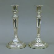 A pair of Georgian Scottish silver candlesticks. Each 29 cm high. 70.7 troy ounces total weight.