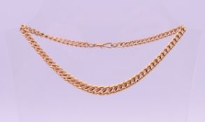 A 9 ct gold graduated curb link chain. 37 cm long. 49.5 grammes.