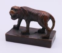 A bronze tiger form seal. 4.5 cm high.