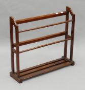 A 19th century mahogany shoe rack. 74.5 cm wide.
