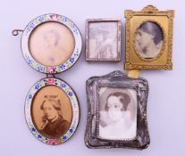 A miniature silver photograph frame,