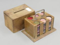 A vintage boxed set of gaming chips. 15 cm high.