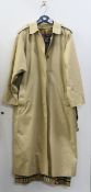 A vintage (pre-1999) Burberrys ladies' trench coat with detachable Nova check wool lining.