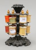 A vintage iron cotton reel holder. 18 cm high.