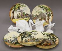 A quantity of Royal Doulton porcelain birds and Series ware porcelain plates. The swan 24 cm long.