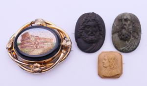A 19th century Grand Tour micro mosaic brooch depicting the Colosseum,
