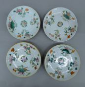 Four 19th century Chinese porcelain dishes. Each 13 cm diameter.