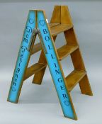 A set of wooden 'champagne' ladders. 87 cm high.