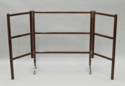 A 19th century mahogany towel rail. 91 cm wide closed.