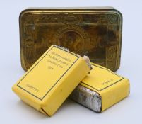 A Princess Mary's 1914 Christmas tin together with two packets of 'Her Royal Highness The Princess
