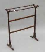 A 19th century mahogany towel rail. 73 cm wide.
