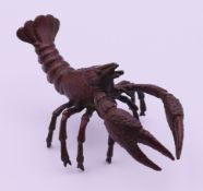 A bronze model of a lobster. 10 cm long.