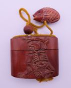A Japanese hardwood inro. 6 cm high.