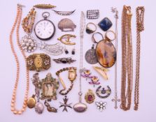 A quantity of various jewellery to include, an RAF brooch, other brooches, chains, a pearl necklace,