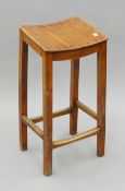 A 19th century stool. 74.5 cm high.