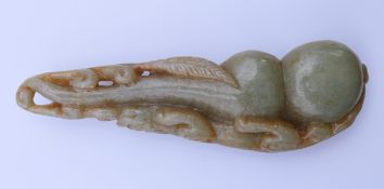 A jade gourd with mythical beast carving. 12.5 cm long.