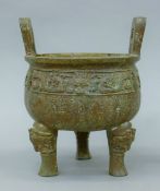A Chinese Archaic-style bronze censer. 23.5 cm high.