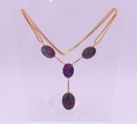 An 18 ct gold and opal pendant necklace. 48 cm long. Pendant opal 3 cm high. 50.