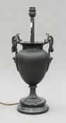 A cast metal table lamp. 43 cm high.
